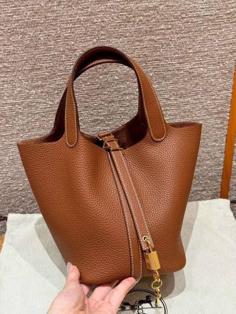 HERMÈS Picotin Lock 18 Bag in Gold Clemence Leather