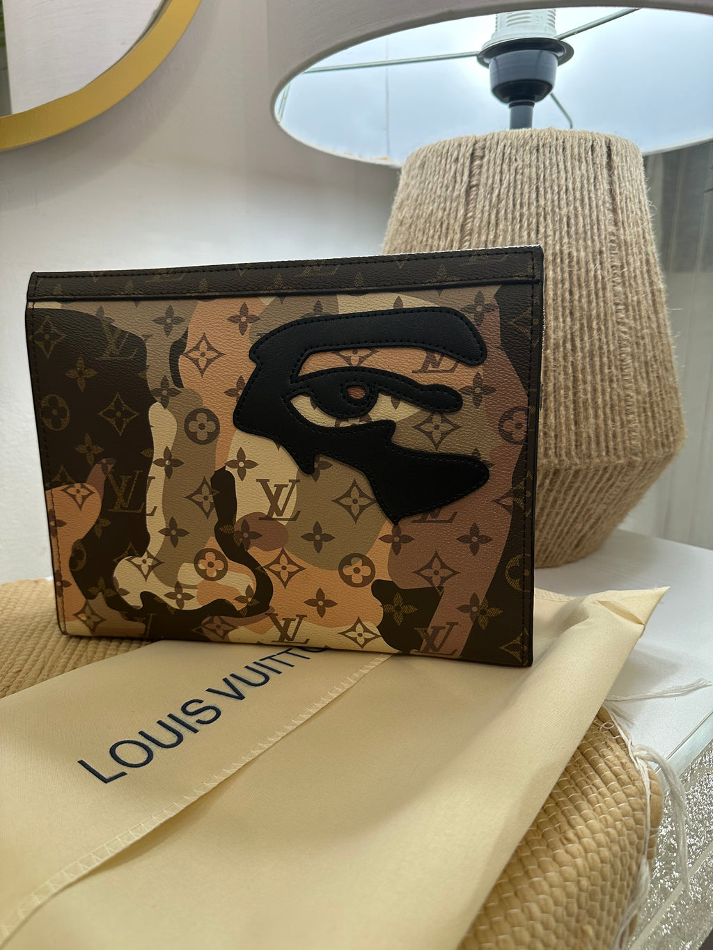 Louis Vuitton Pochette Voyage face portrait
