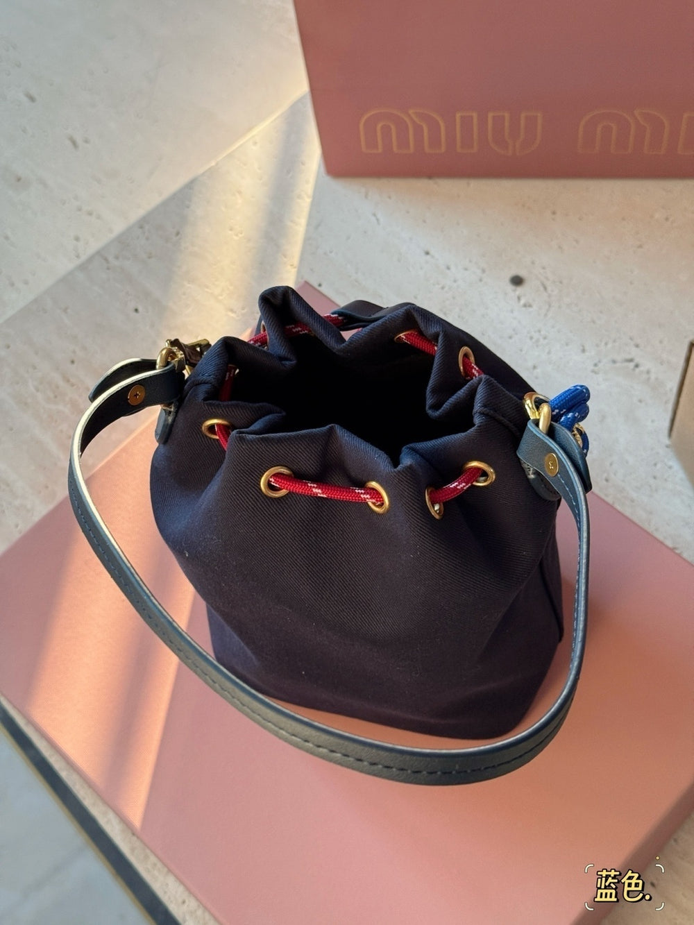 Miu Miu Logo Canvas Drawstring Bucket Bag