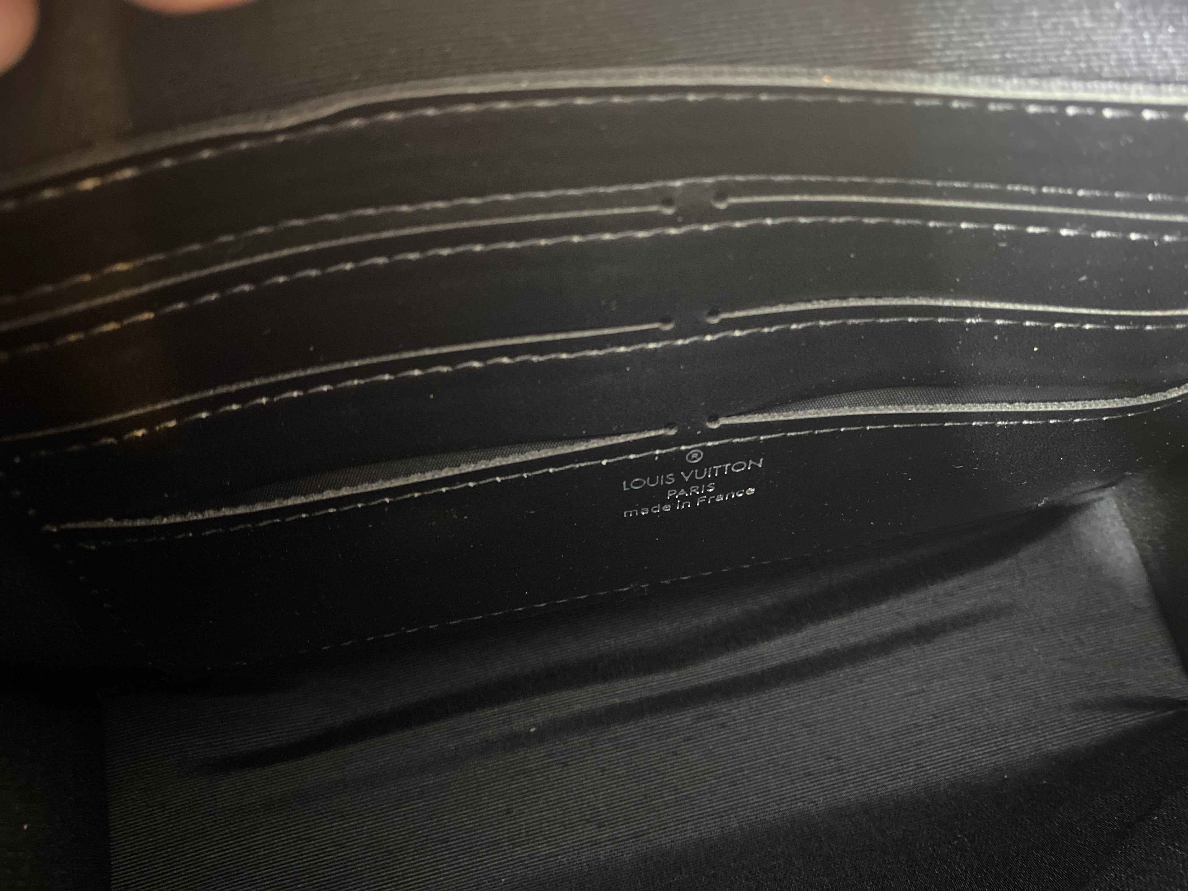 Louis Vuitton Pochette Voyage face portrait