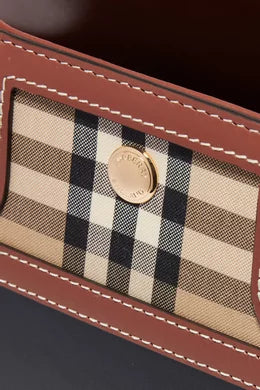 BURBERRY
Mini Title Bag in Vintage Check &amp; Leather