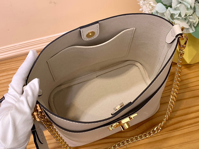 Louis Vuitton Lock and Walk Shoulder Bag