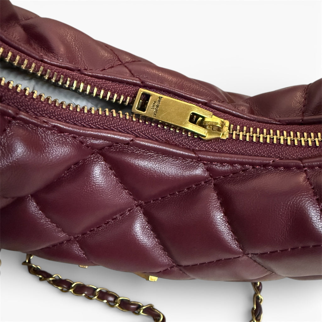 Saint Laurent (YSL) Quilted Hobo Bag with Cassandre Logo