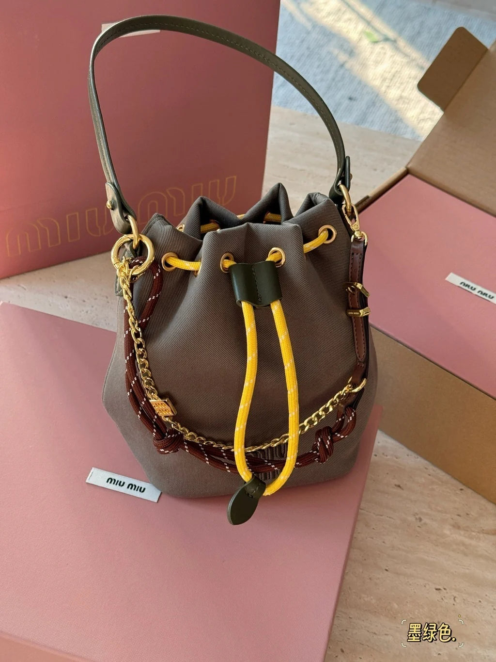 Miu Miu Logo Canvas Drawstring Bucket Bag