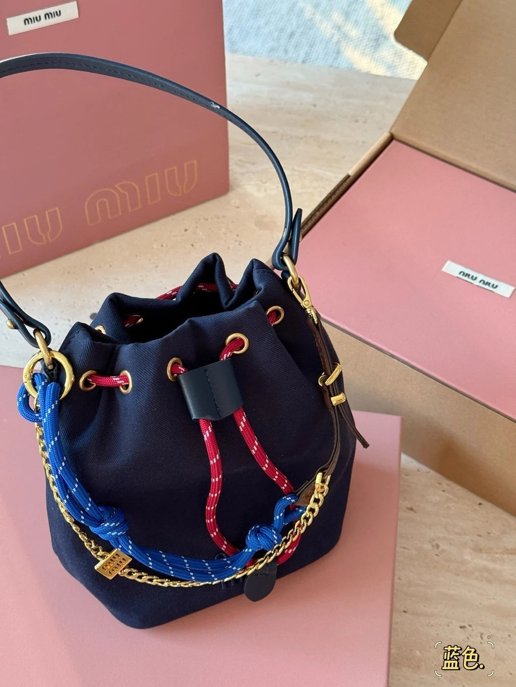 Miu Miu Logo Canvas Drawstring Bucket Bag