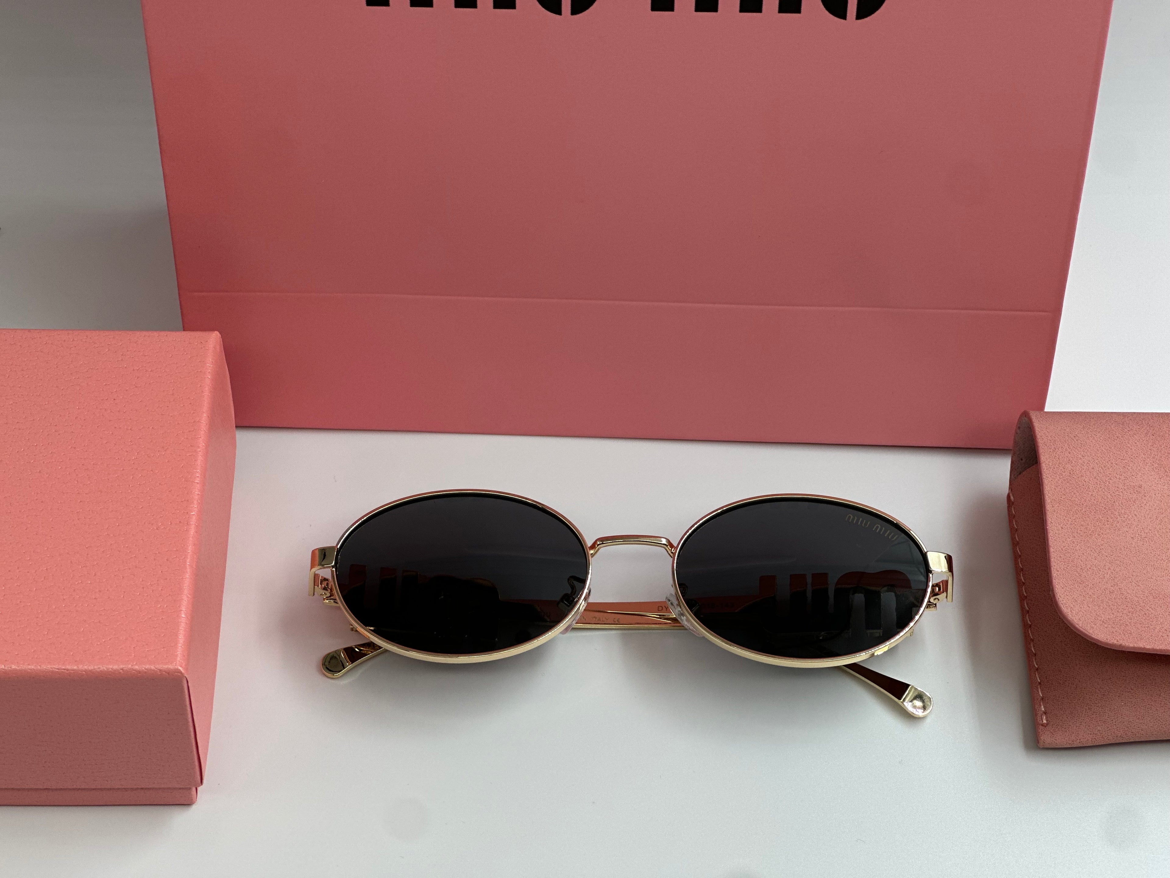 Miu Miu Crystal Oval Sunglasses