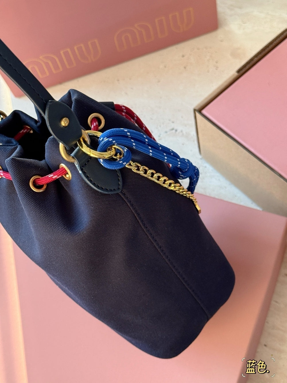 Miu Miu Logo Canvas Drawstring Bucket Bag