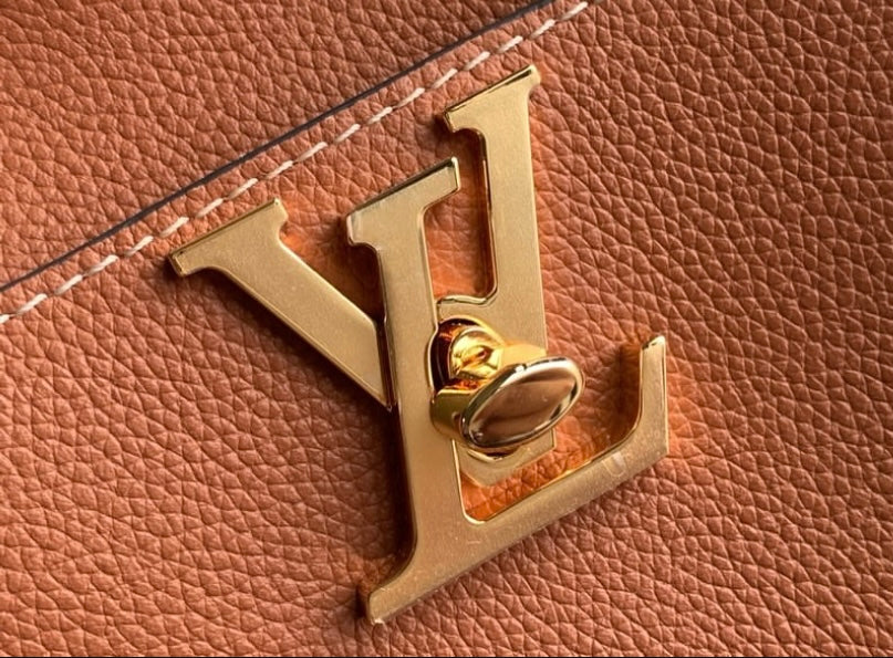 Louis Vuitton Lock and Walk Shoulder Bag