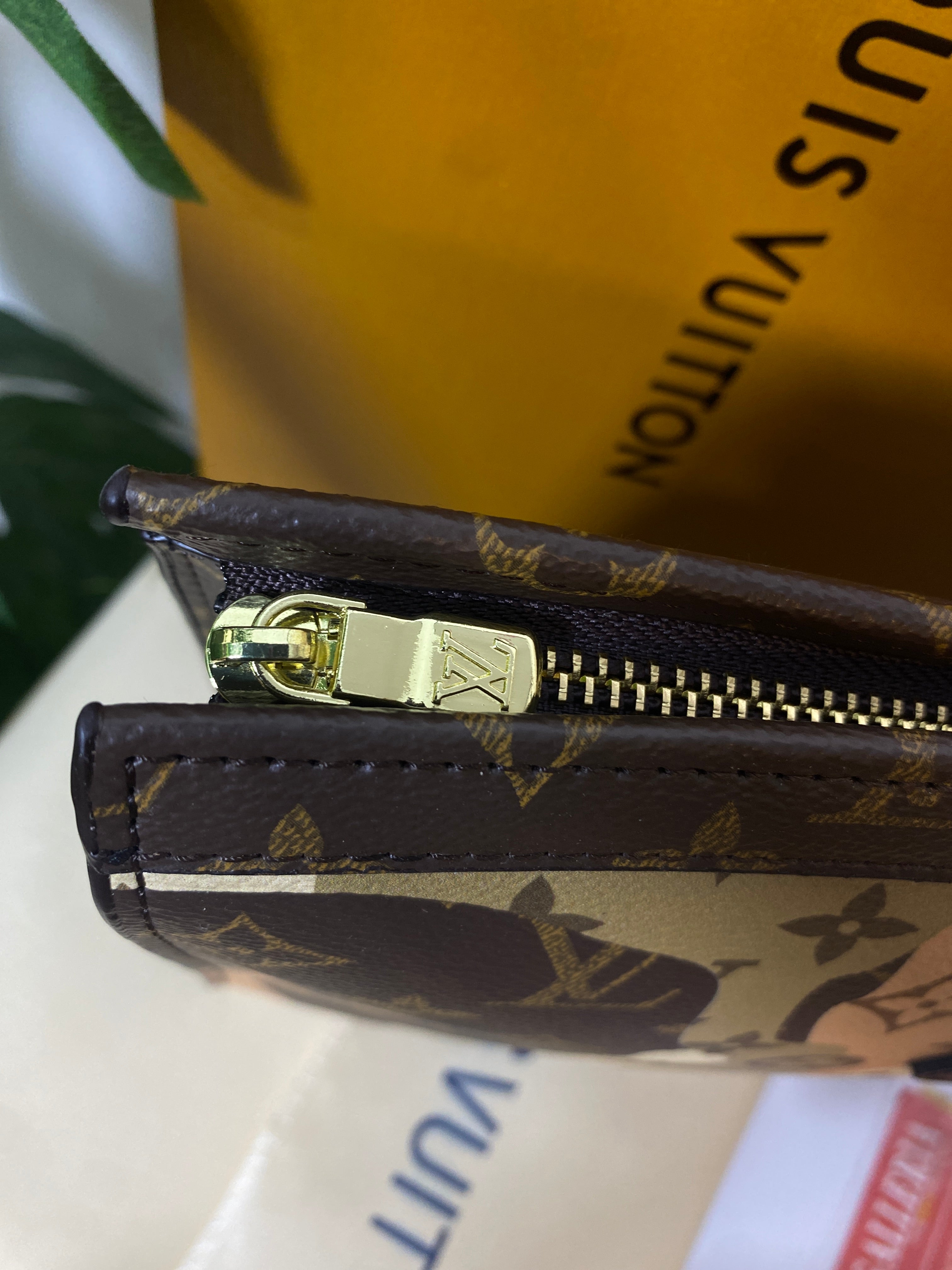 Louis Vuitton Pochette Voyage face portrait