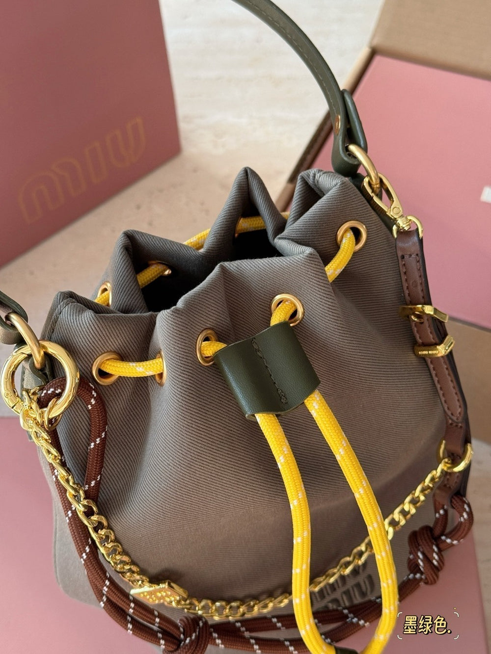 Miu Miu Logo Canvas Drawstring Bucket Bag